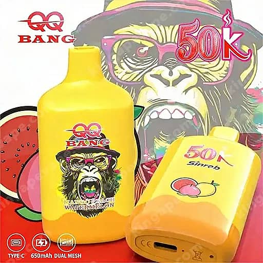 Bright Yellow Vape Bottle And A Matching Yellow Device In Front Of A Colorful Monkey-Themed Promotional Background, Both Featuring A Cartoon Monkey With Sunglasses And The Branding, With Fruit Graphics And The Prominent 50K Price Text.