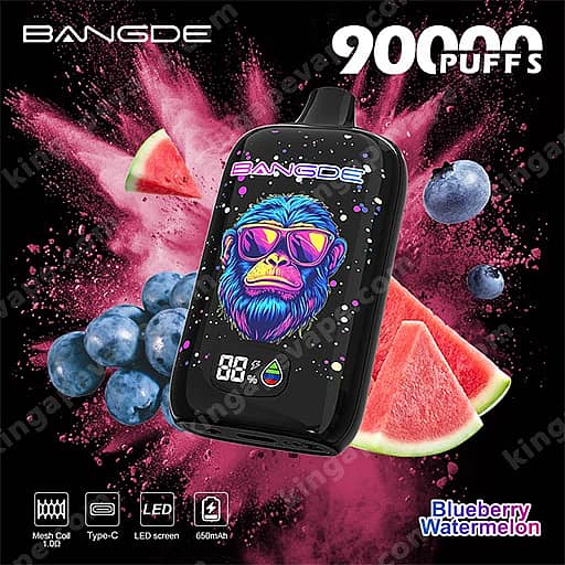 Bang De 90000 Puffs Disposable Vape | Smart Led Screen &Amp; Mesh Coil 11 Black Disposable Vape Device With A Neon-Colored Gorilla Artwork On The Front, Branded Bangde With '9000 Puffs,' Shown Among Pink Powder Bursts And Watermelon And Blueberry Fruit Graphics.