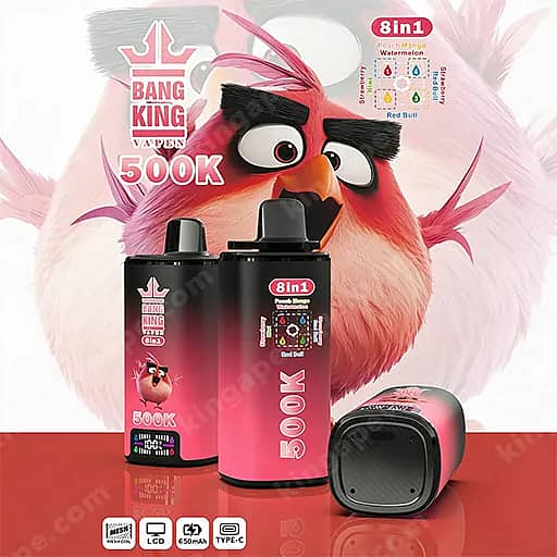 Two Bang King Vapen Bottles With Pink Gradient Labels (8In1 And 500K) Stand On A Red Surface Beside A Small Pod, With A Large Pink Cartoon Bird In The Background.